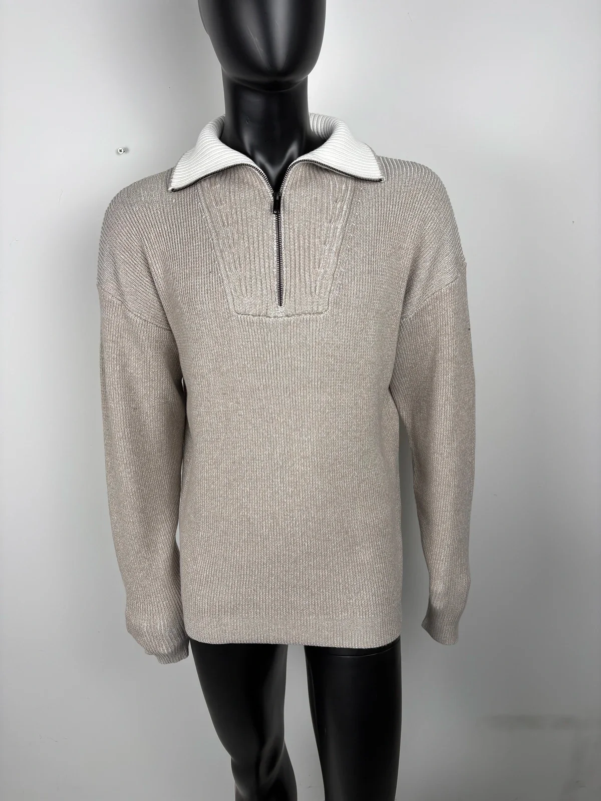 Half-zip jumper on a mannequin in the studio