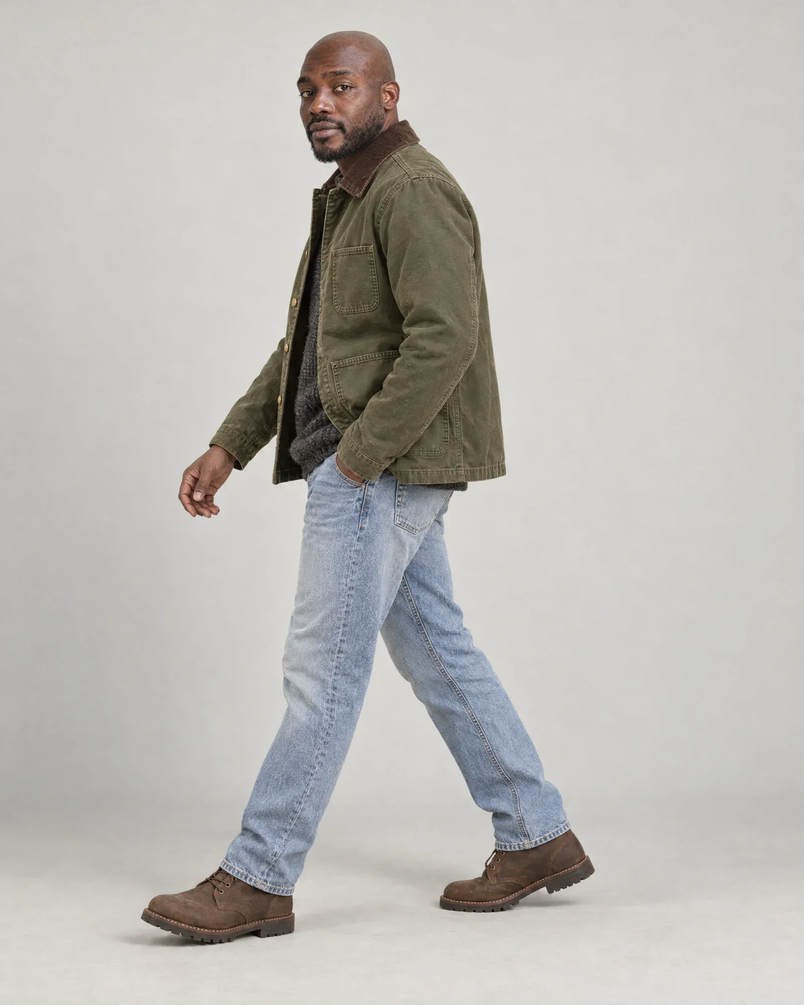 Jesse in the same look in the studio, walking