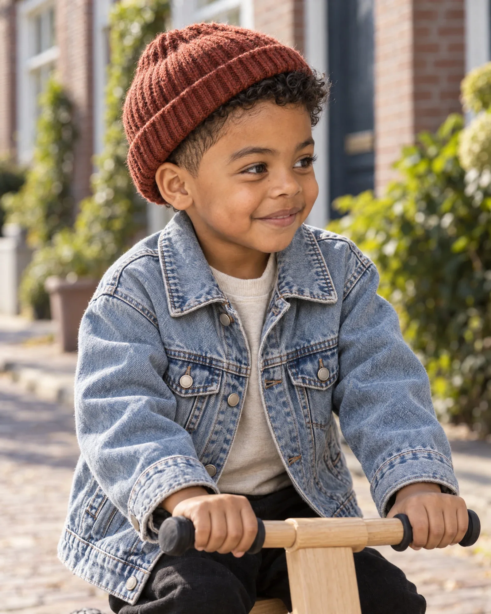 Sem smiling, close up, in the same denim jacket