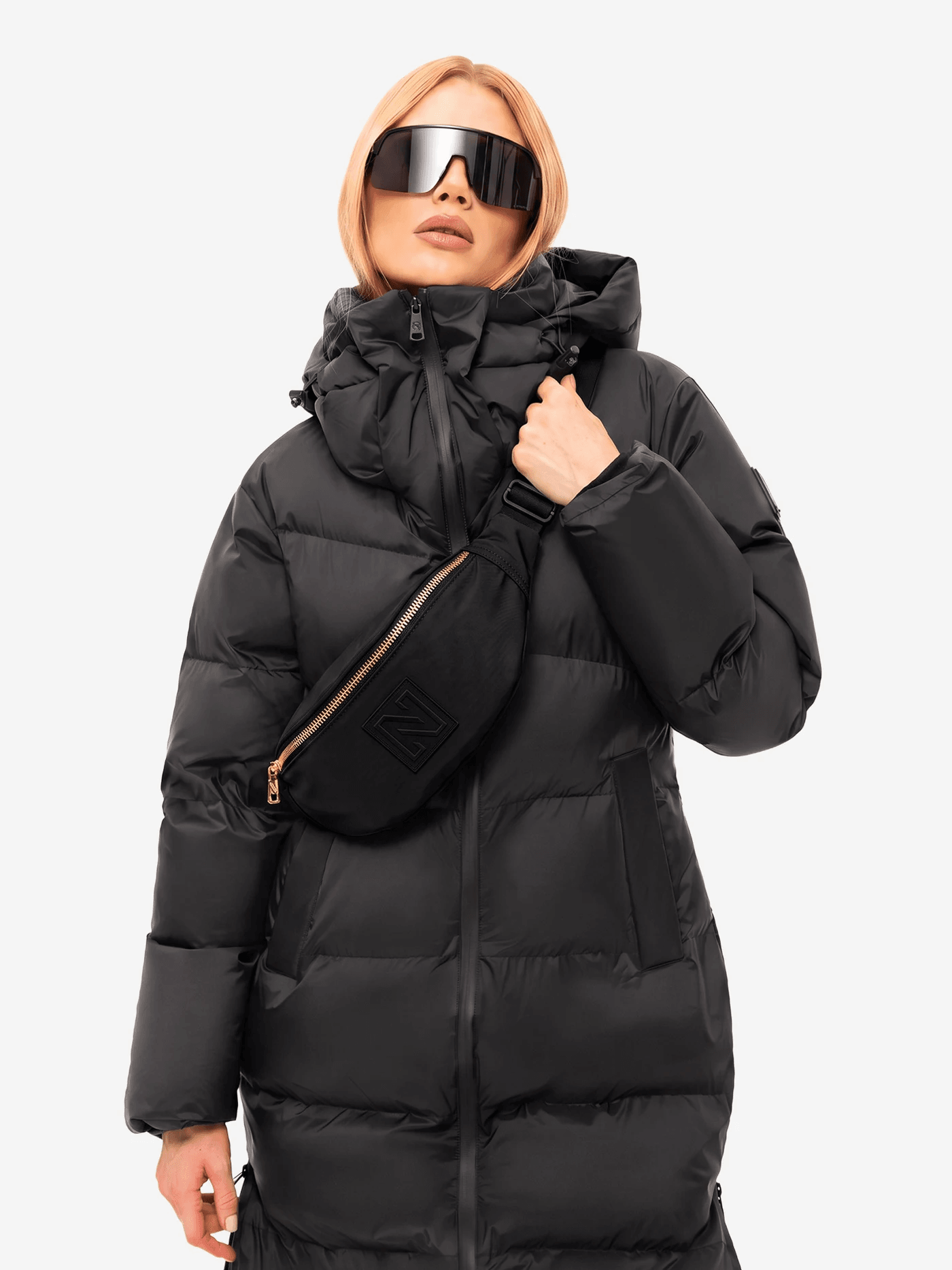 Model in black down jacket, automatically edited from a supplier image