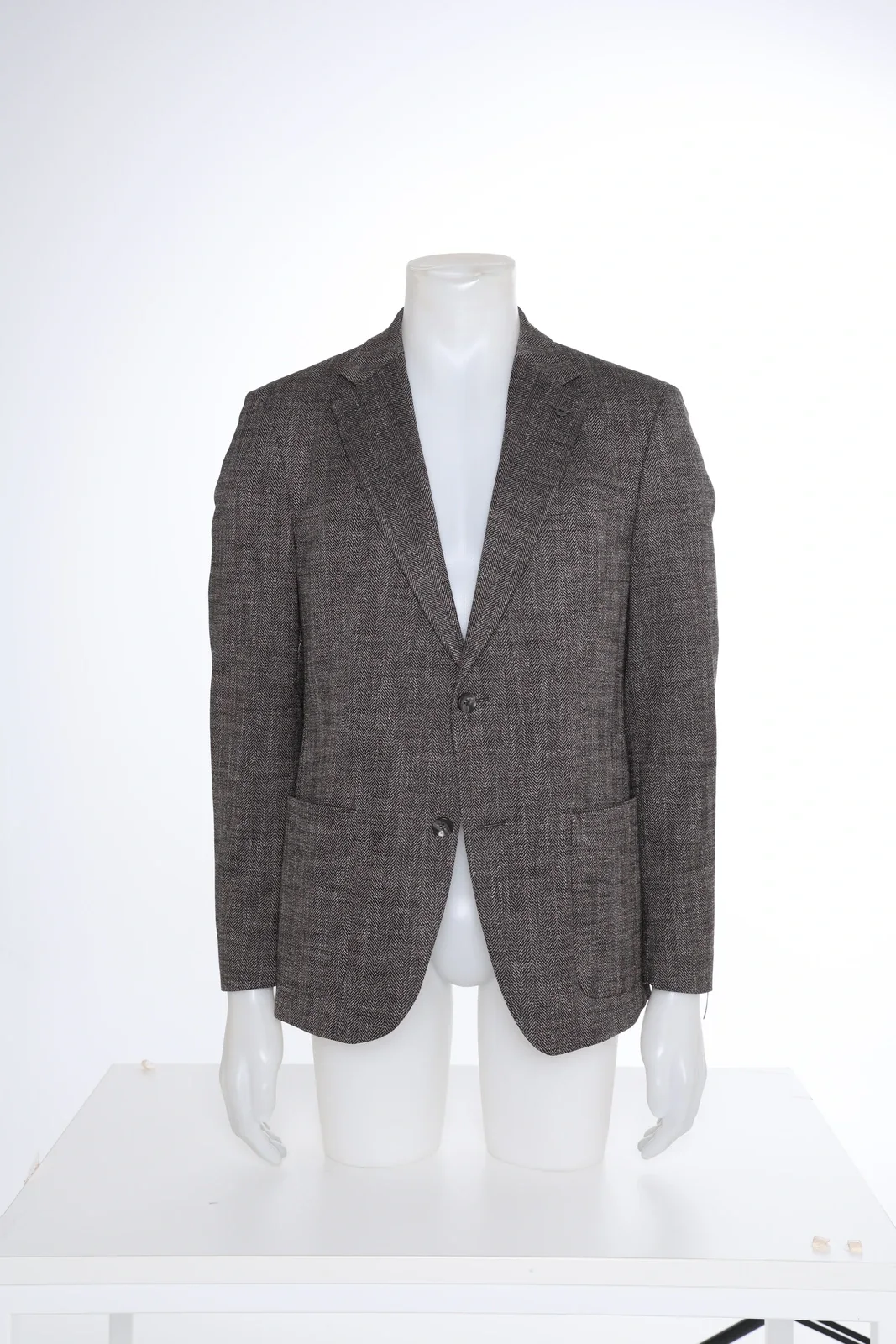 Tweed jacket on a mannequin in the studio